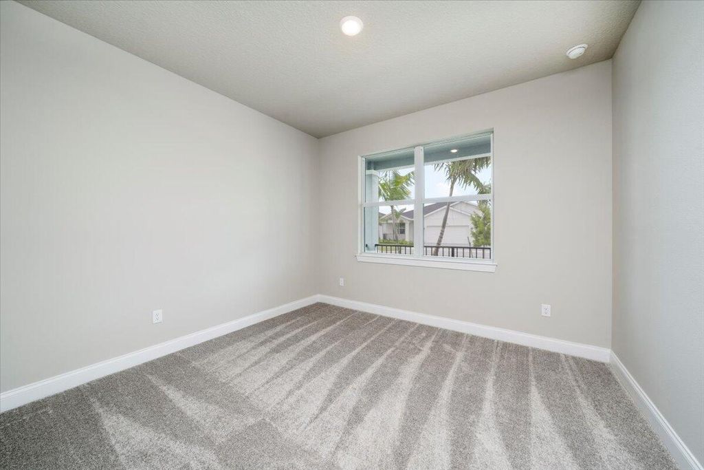 Photo of 6383 NW Sweetwood Drive, Port Saint Lucie, FL 34987 (MLS # R11013765)