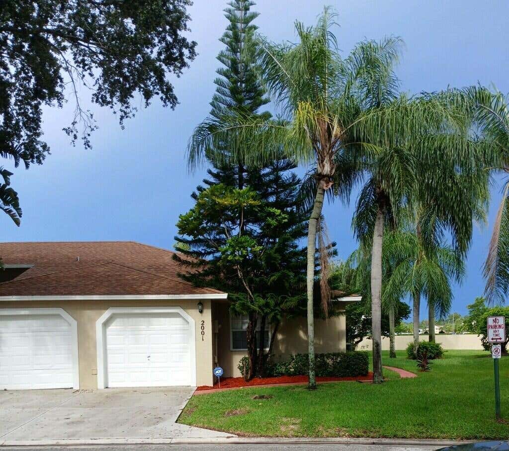 Photo of 2001 Maplewood Drive, Greenacres, FL 33415 (MLS # R11014939)