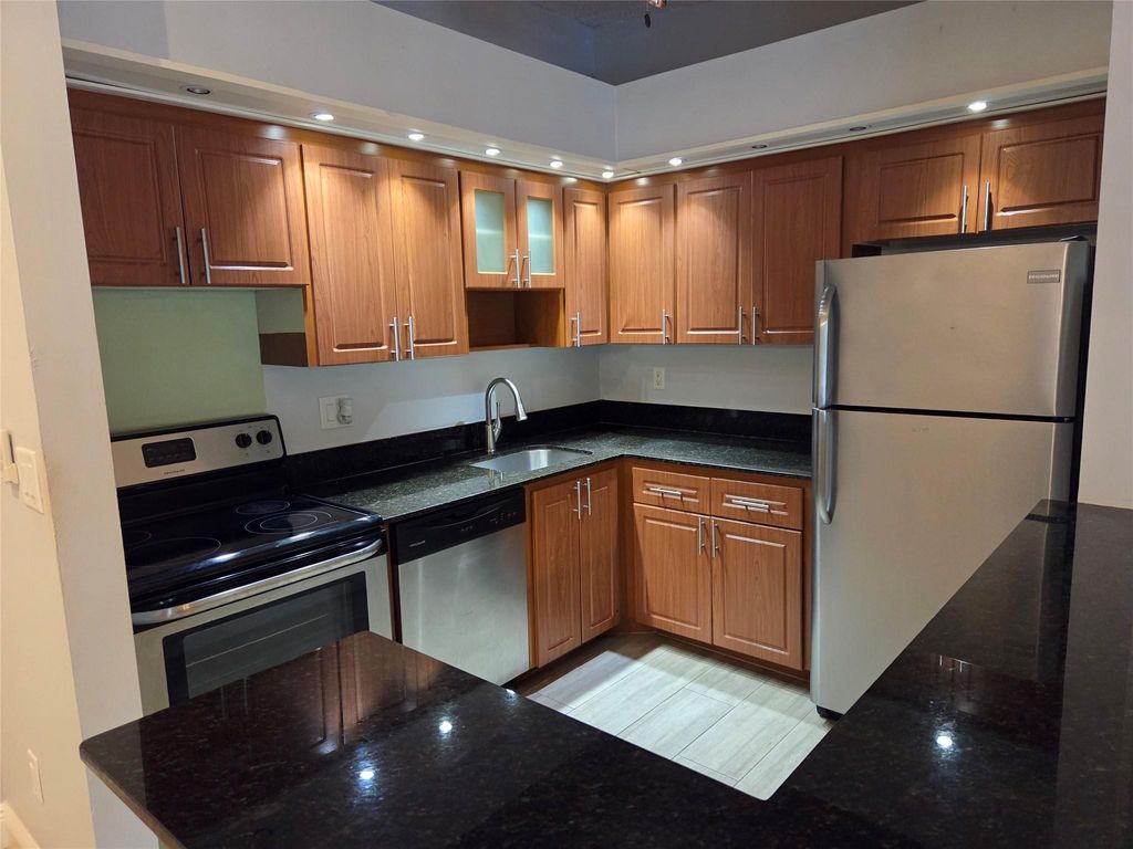 Photo of 10403 E Clairmont Cir #209, Fort Lauderdale, FL 33321 (MLS # F10513827)