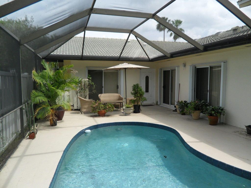 Photo of 12597 Woodmill Drive, Palm Beach Gardens, FL 33418 (MLS # R10976352)