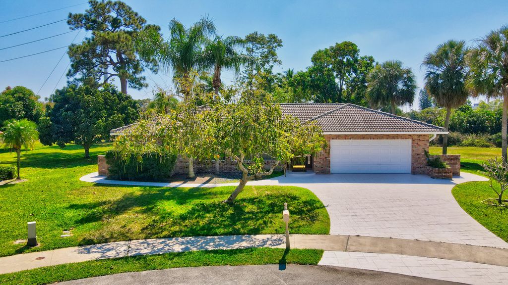 Photo of 2334 Timbercreek Circle NW, Boca Raton, FL 33431 (MLS # B26008727)