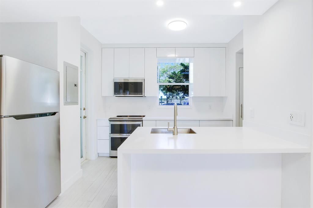 Photo of 1140 University Boulevard #13, Jupiter, FL 33458 (MLS # R10873144)