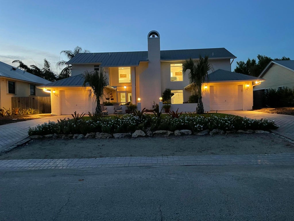 Photo of 5125 SE Matousek Street, Stuart, FL 34997 (MLS # B26069120)