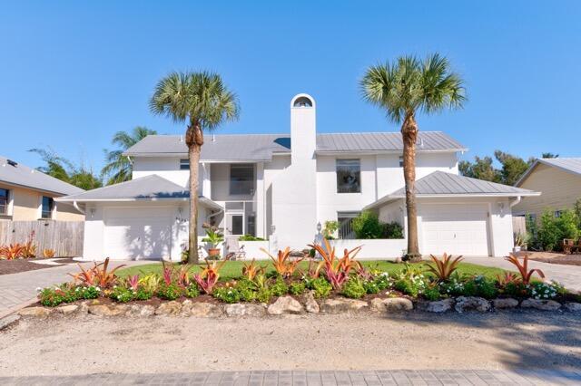 Photo of 5125 SE Matousek Street, Stuart, FL 34997 (MLS # B26069120)
