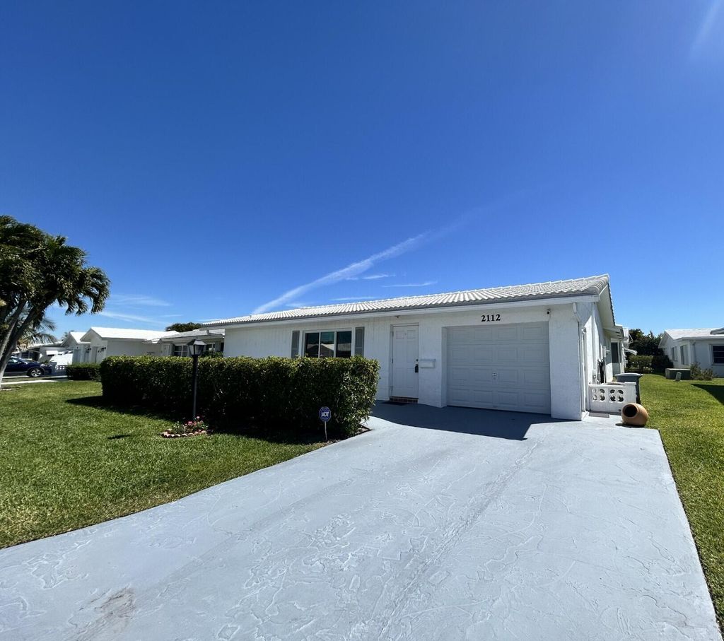 Photo of 2112 SW 22nd Street, Boynton Beach, FL 33426 (MLS # R11070632)