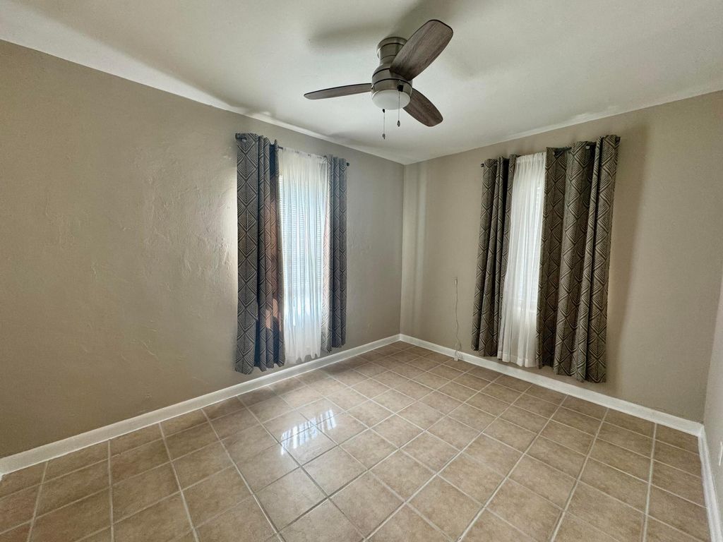 Photo of 839 NW 16th Terrace, Fort Lauderdale, FL 33311 (MLS # B26000461)
