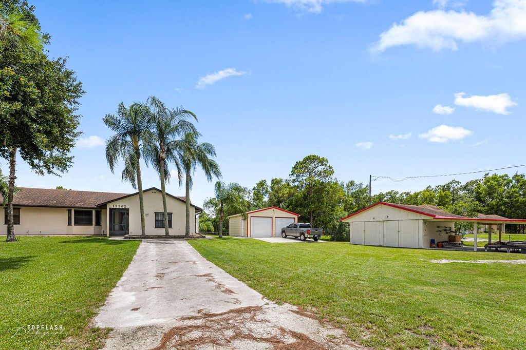 Photo of 13262 56th Place Way N, The Acreage, FL 33470 (MLS # R10807312)