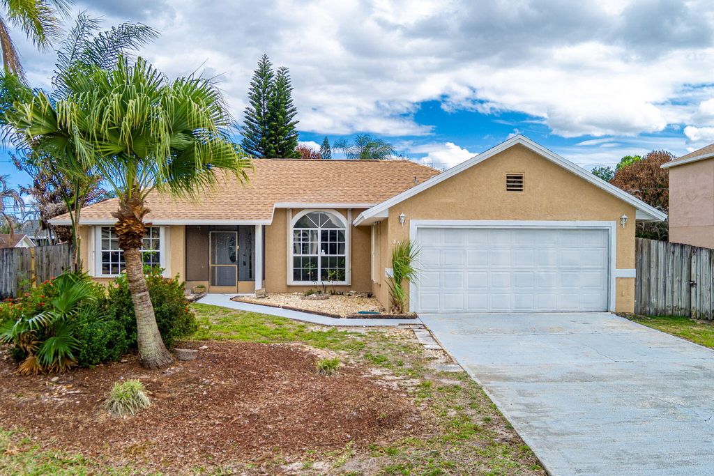 Photo of 868 SW Duncan Terrace, Port Saint Lucie, FL 34953 (MLS # B26020257)