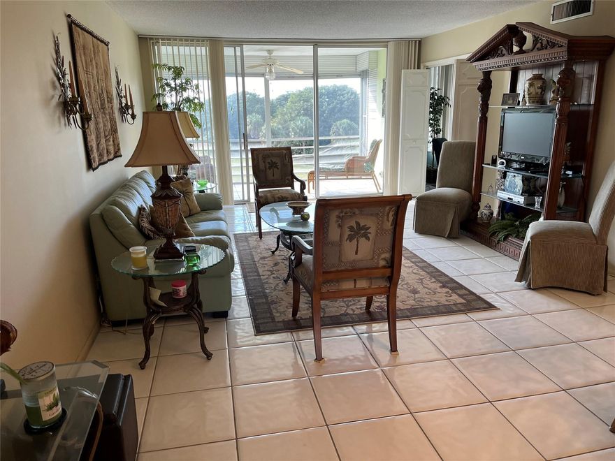 THIS PROPERTY IS APPROVED FOR FINANCING BY FNMA !!!!Return to the age of elegance. This stunning apartment will wrap you in it's luxury.  Here's a spacious 2 bedroom and 2 full bath unit which, from its screened balcony, provides gorgeous views of the fairway of the 18th hole of the Palms Golf Course.  There's a choice of 2 swimming pools in your front yard.  Close to everything. You can gamble the night away in the Casino which is steps from your doorstep. This unit provides an affordable entry into the dazzling World of Palm Aire.  This apartment is dramatically furnished with the charm and dignity of days gone by.  Apartment is being sold "AS-IS"  Information believed to be accurate but should be independently verified. THIS PROPERTY IS APPROVED FOR FINANCING BY FNMA !!!!Return to the age of elegance. This stunning apartment will wrap you in it's luxury.  Here's a spacious 2 bedroom and 2 full bath unit which, from its screened balcony, provides gorgeous views of the fairway of the 18th hole of the Palms Golf Course.  There's a choice of 2 swimming pools in your front yard.  Close to everything. You can gamble the night away in the Casino which is steps from your doorstep. This unit provides an affordable entry into the dazzling World of Palm Aire.  This apartment is dramatically furnished with the charm and dignity of days gone by.   Apartment is being sold "AS-IS"   Information believed to be accurate but should be independently verified.