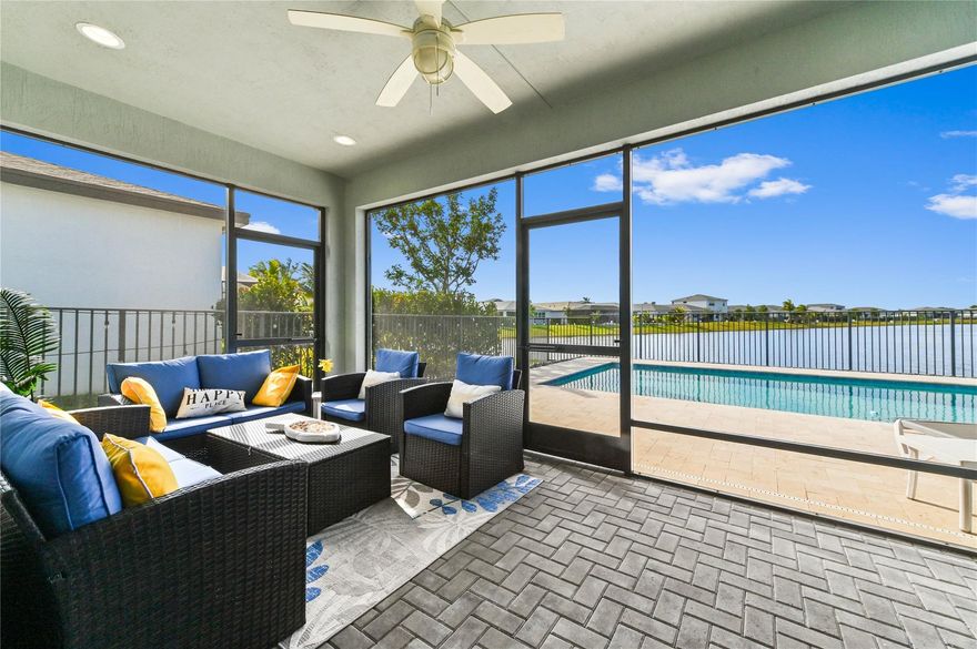 AMAZING sunsets to view from floating in your salt water-heated pool & screened back porch & fenced yard. This 3/2 w/laundry room & primary walk-in closet along w/spacious open concept w/stainless appliances & gas stove w/island area. Updated lighting - European custom curtains & blinds in bedrooms. HOA monthly payments include, Cable, Alarm, Internet, Lawn Care, and Sprinklers. GAS hot water heater and dryer and impact windows are more energy efficient. Garage epoxy floor-Furniture negotiable. Over $100K of upgrades. Amenity Center w/gym, tennis courts, dog park. Tradition shuttle to Tradition Square for dining & entertainment & Tradition Heart within walking distance for shopping & eating area. Cleveland Hospital close. New Tradition Regional Park and Stars & Stripe Park to open soon.