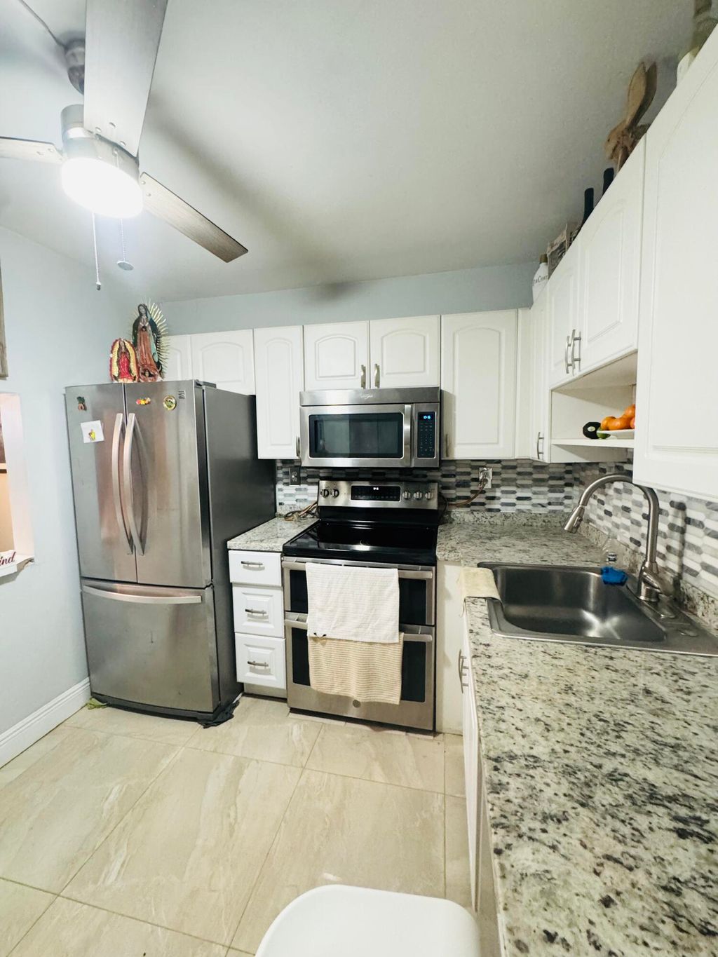 Photo of 9370 SW 8th Street #117, Boca Raton, FL 33428 (MLS # B26040383)