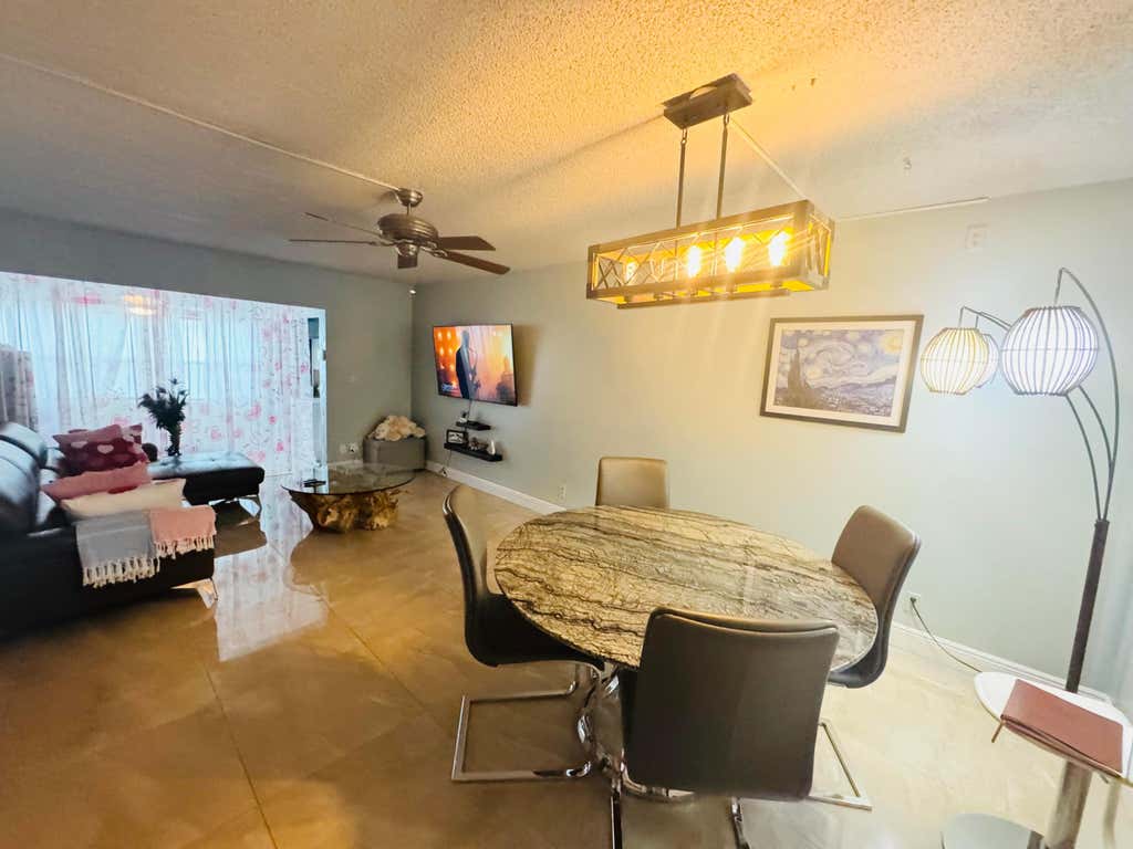 Photo of 9370 SW 8th Street #117, Boca Raton, FL 33428 (MLS # B26040383)