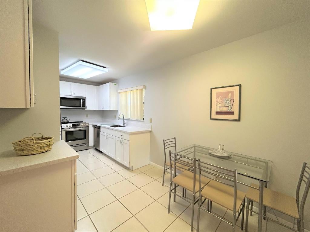 Photo of 3101 Lucerne Park Drive, Greenacres, FL 33467 (MLS # R11112966)
