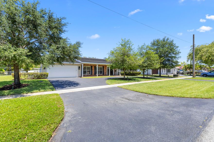 Amazing 5bed 3bath home in the heart on Plantation-no HOA;Expanded w/ permits & an ideal choice for large family, teens, or multigenerational; 2014 tile roof w/ impact sky lights;All impact windows & doors; 2006 generator; updated pool area w/ 623sf stone flooring/newer screen enclosure & huge covered patio;Updated real oak flooring throughout;high ceiling heights throughout;Kitchen is expanded w/abundant cabinets/storage; bathrooms have been updated;primary bedroom has walk-in closet & built-ins plus a large on-suite bathroom;covered front porch w/ new porcelain flooring; garage has work bench, ceiling storage systems; smart irrigation system;laundry room;extra large circular driveway;walk to newly remodeled Liberty Park; HUGE lot;Dead end street; all openings miami-dade rated flood disclosure & LBP attached