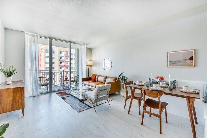 AVAILABLE SEASONALLY STARTING NOVEMBER 1. OPEN TO ANNUAL INQUIRIES AS WELL. Luxury doorman building in the heart of Downtown West Palm Beach. Across from City Place, a few short blocks to the waterfront, Clematis St., and just over the bridge from Palm Beach Island. This 1 br/1.5 bath unit is immaculately maintained. New TV's, glass shower door, and window treatments (not pictured) were recently installed. Enjoy unique features such as all West Elm furnishings and linens, a Sonos speaker system, smart TV, and nest thermostat. In the bedroom, the king size Casper mattress and built out California Style Closet will ensure comfortability as well as the cozy couch and dining area. The kitchen is complete with designer dishes, linen napkins and a full cookware set for preparing homemade meals