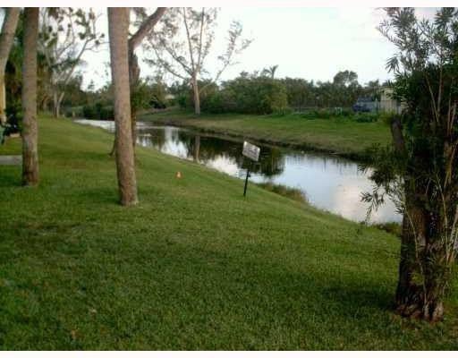Photo of 11458 Royal Palm Boulevard, Coral Springs, FL 33065 (MLS # B26059539)