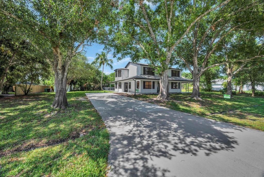 Photo of 2033 SW Justison Avenue, Port Saint Lucie, FL 34953 (MLS # R11093813)