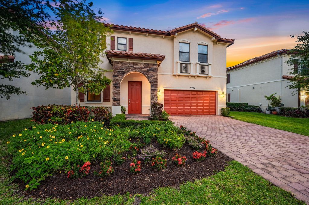 Photo of 6009 Night Heron Court, Greenacres, FL 33415 (MLS # B26017774)