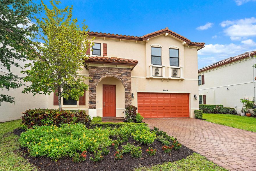 Serene Lakefront Living Meets Modern Craftsmanship. Discover the perfect fusion of sophisticated design and suburban tranquility in this meticulously upgraded 4-bedroom residence. Situated on a premium lakefront lot, this home has been thoughtfully reimagined with high-caliber workmanship and contemporary finishes, offering a "turn-key" lifestyle just minutes from the vibrant energy of West Palm Beach. Expertly curated Interior upgrades every inch of this home reflects a commitment to quality, featuring a crisp, professional paint palette throughout that enhances the natural light and architectural lines. Refined flooring: The main living areas feature elegant tile work, providing a custom feel and a sense of expanded space.  The transition to the private quarters is seamless, highlighted by brand-new, flooring in the primary suite for a warm, modern aesthetic. The chef's kitchen: A centerpiece of craftsmanship, the kitchen boasts rich espresso cabinetry paired with durable, high-end quartz countertops. The design is tied together by an intricate mosaic tile backsplash, balancing functional workspace with designer flair. Designed for the modern lifestyle. The primary retreat: Wake up to calming lake views in a spacious suite designed for relaxation. It features expansive walk-in closets and a spa-inspired ensuite bathroom with a separate soaking tub and walk-in shower. Thoughtful layout: The second-floor laundry room is a masterclass in convenience, strategically placed to streamline family chores. Outdoor living: Enjoy morning coffee or evening sunsets over the water from your private backyard, overlooking the serene local lake. Unbeatable location & amenities. Located in the heart of West Palm Beach / Greenacres, you are a "stone's throw" from the high-end dining, shopping, and cultural nightlife of West Palm Beach. Within the community, residents enjoy exclusive access to: A resort-style Clubhouse and lanai sparkling swimming pool. Fully equipped fitness center. community playground. Whether you are a professional seeking a peaceful retreat near the city or a family looking for a move-in-ready sanctuary, this home offers an incredible opportunity to experience South Florida living at its finest. Schedule your private tour today to experience this level of craftsmanship in person.