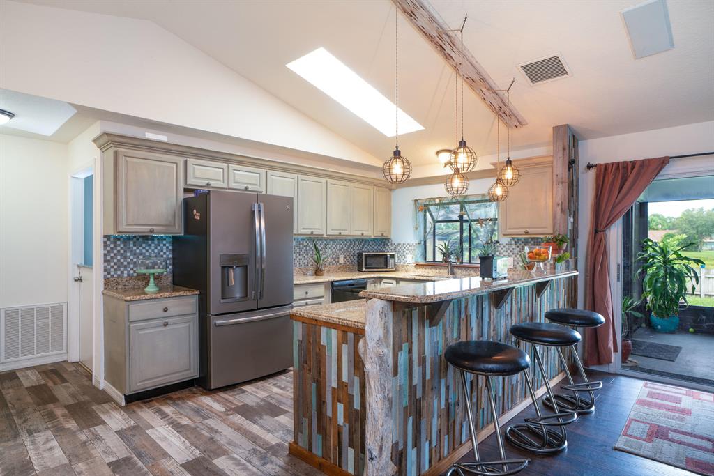 Piece of heaven on Earth! This lovely and spacious 3/2/2 Smart Home is nestled on a beautiful preserve where wildlife is abound. Smart home features: Nest doorbell, thermostat & smoke alarms. Master bath has bluetooth speaker and ambiant lights, living room TV(Samsung 65''), Definitive Technology speakers/surround sound, Sony receiver, Universal remote, wired above head speakers in living room as well as patio wired ALL INCLUDED with home. A/C 5 yrs old, New screened porch, raised garden beds, most all appliances new, large dog bathing tub in laundry room, water heater 1 year old. Owner occupied and EASY TO SHOW!