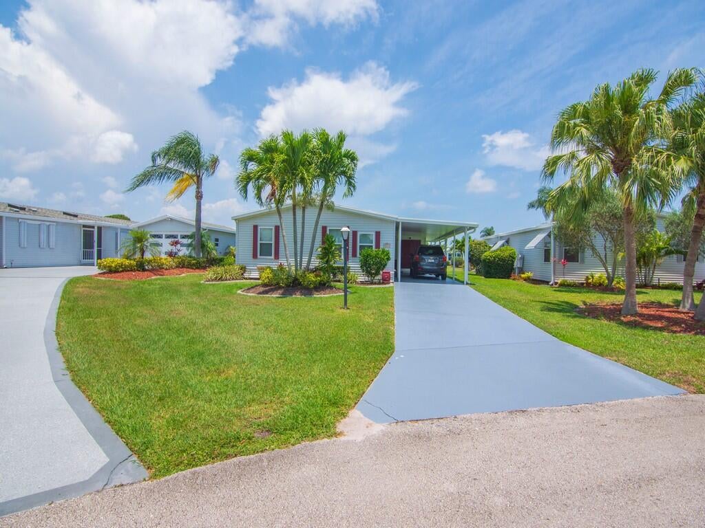 Photo of 8471 Schefflera Court, Port Saint Lucie, FL 34952 (MLS # B26078217)