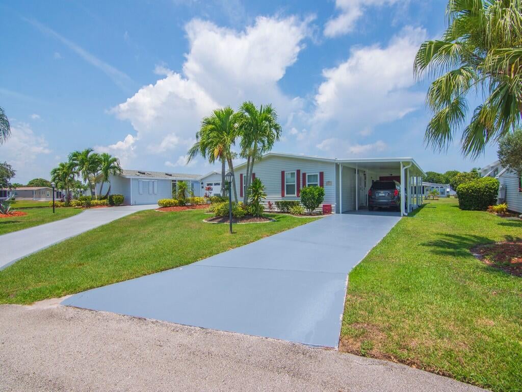 Photo of 8471 Schefflera Court, Port Saint Lucie, FL 34952 (MLS # B26078217)