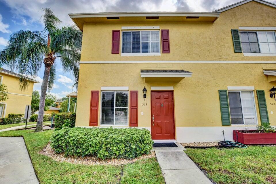 Rarely available 2/2.5 end-unit townhome across from the pool and minutes from the beach! Features 2 spacious bedrooms with On-suite baths and large closets, a formal dining room, roomy kitchen, and half bath downstairs. Roof completed in 2021. Enjoy coffee, evening meditations, or cookouts on your private patio. Located in a family-friendly, pet-friendly community with pool, and playground. Walk to Lantana Elementary! No rentals per HOA. Low HOA fee includes lawn care, and amenities.