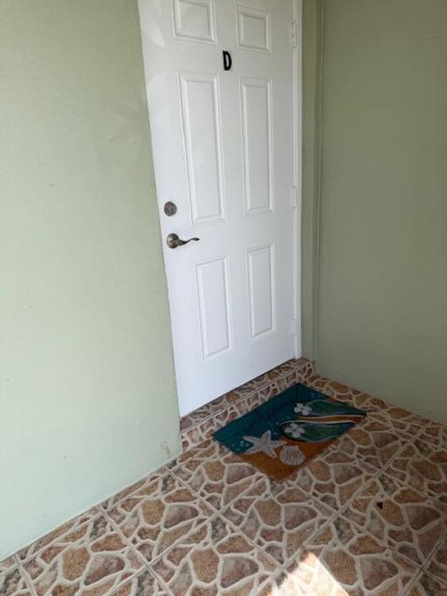 Beautifully maintained end condo in this gated senior complex. The owner had updated the kitchen with a partial wall removal & a butcher block snack bar. Lots of cabinets & drawers for plenty of storage in kitchen. Owner installed a laundry closet w/full size washer/dryer in the dining area. There is still room for a small dining set, or the FL RM could serve as a formal dining room. Tiled floors except in bedrooms, pretty accent walls in living area. Updated vanities in both baths with new tiled floor in guest bath. Master bath has the tub with original tiled walls. Owner installed large open patio at back of condo as a great place to grill out or enjoy nature.
