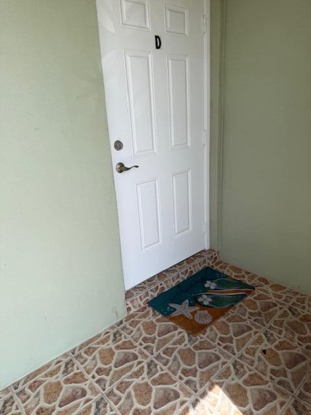 Photo of 115 Lakes End Drive #D, Fort Pierce, FL 34982 (MLS # B26025974)