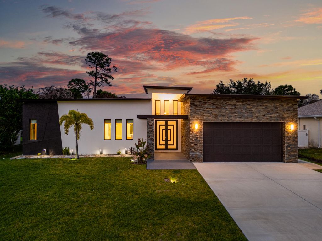 Photo of 1783 SW Erie Street, Port Saint Lucie, FL 34953 (MLS # B26008049)