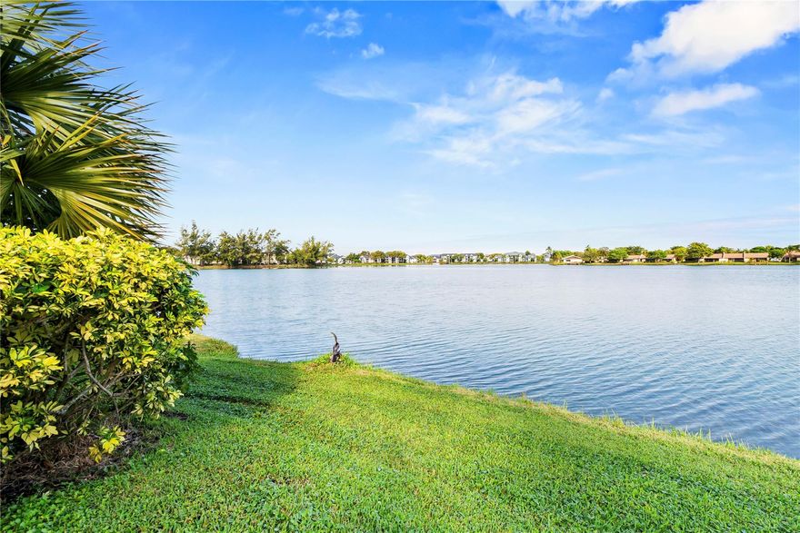 MAYOR PRICE REDUCTION.  HURRY THIS Beautiful lake-view corner unit on the first floor featuring 2 bedrooms and 2 bathrooms all ages WON'T LAST. This bright and airy condo offers added privacy, abundant natural light, and effortless ground-level access. Enjoy peaceful water views from a serene setting, perfect for relaxing at home, while still being conveniently close to shopping, dining, and everyday essentials. Located in a well-maintained community with NO rentals permitted, ideal for owner-occupants seeking comfort and tranquility.