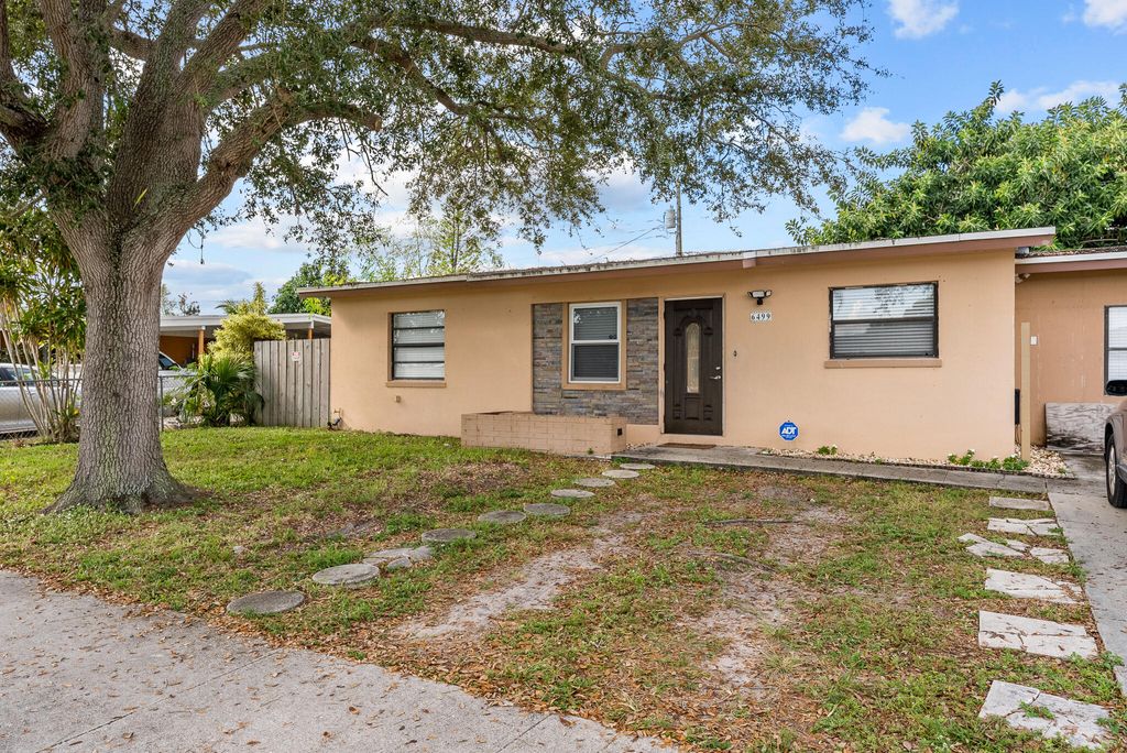 Photo of 6499 Seminole Drive Dr, Lake Worth Beach, FL 33462 (MLS # R10761440)