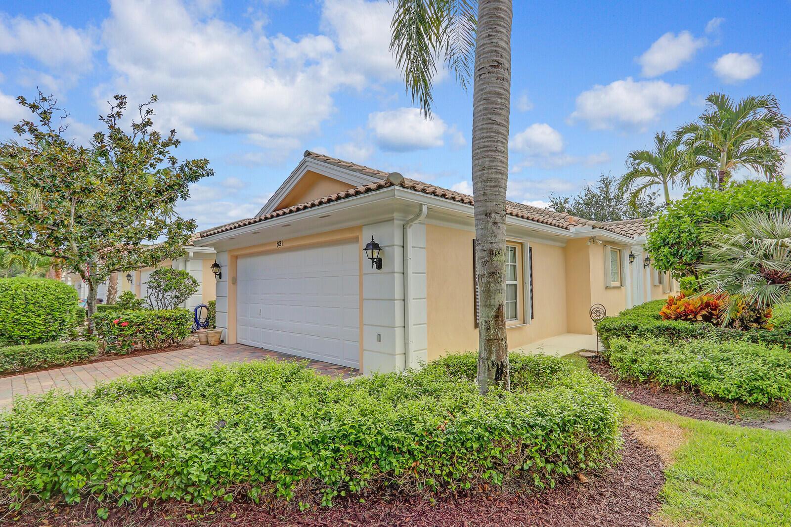 Welcome to this rarely available Divosta Capri model. Upon entering, you'll immediately notice the open floor plan and the bright, airy feel. This home is designed for both comfort and style, featuring a new refrigerator (2025) and A/C (2024). The spacious primary bedroom is a peaceful retreat, featuring a spacious bath room and serene lake views. A unique and highly sought-after feature of this model is that both bedrooms function as private suites, offering exceptional flexibility for guests or family. This light-filled home boasts plenty of living space, including a formal living and dining area. Ideal location placing you close to the best restaurants, shopping, I95 and approx 7 minutes to the beach!