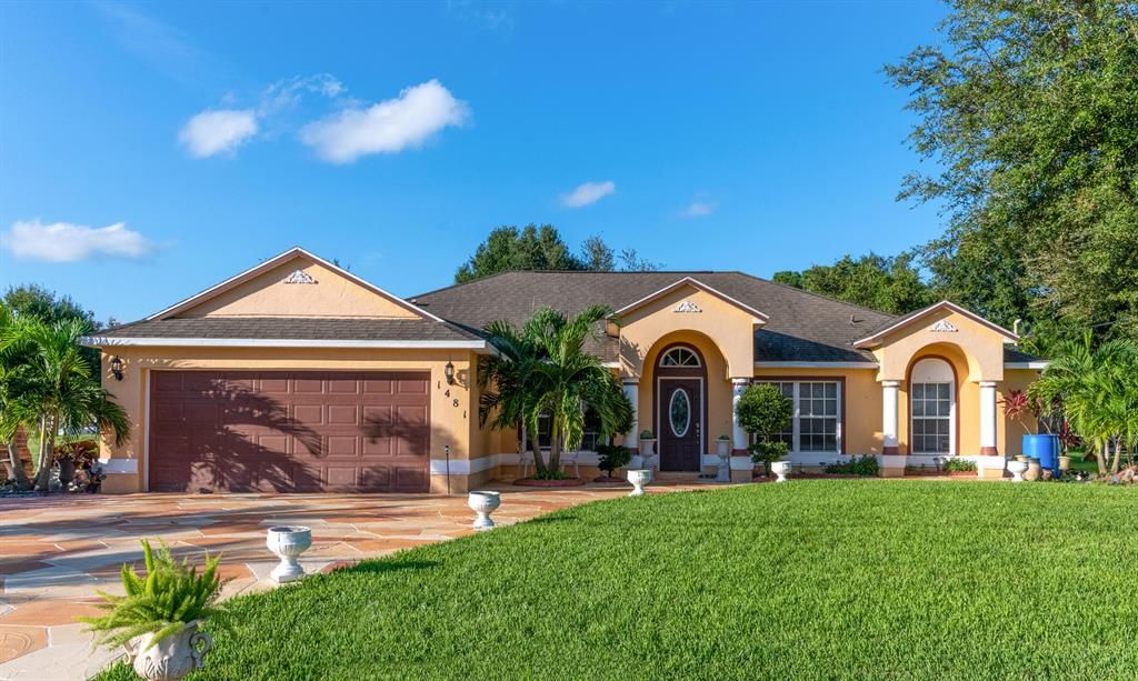 Photo of 1481 SW Algardi Lane, Port Saint Lucie, FL 34953 (MLS # R10749028)