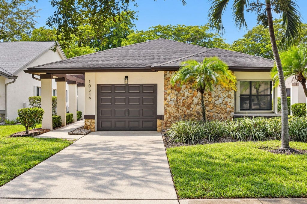 Photo of 10549 Fern Tree Way, Boynton Beach, FL 33436 (MLS # B26079729)