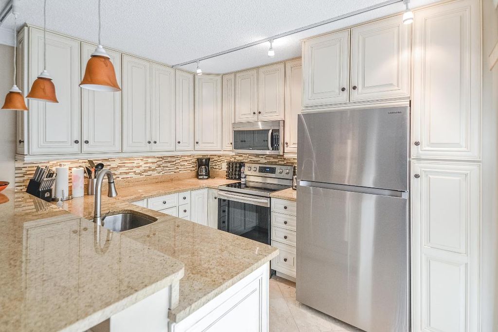 Photo of 1718 17th Court, Jupiter, FL 33477 (MLS # R10959700)