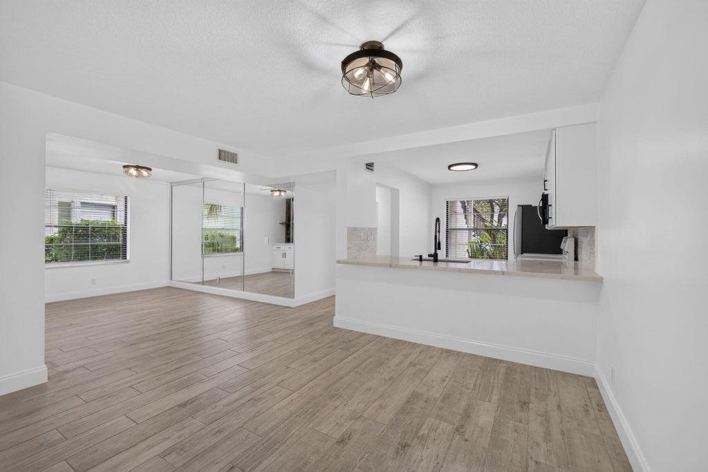 Photo of 1701 Sabal Ridge Circle #D, Palm Beach Gardens, FL 33418 (MLS # B26075577)