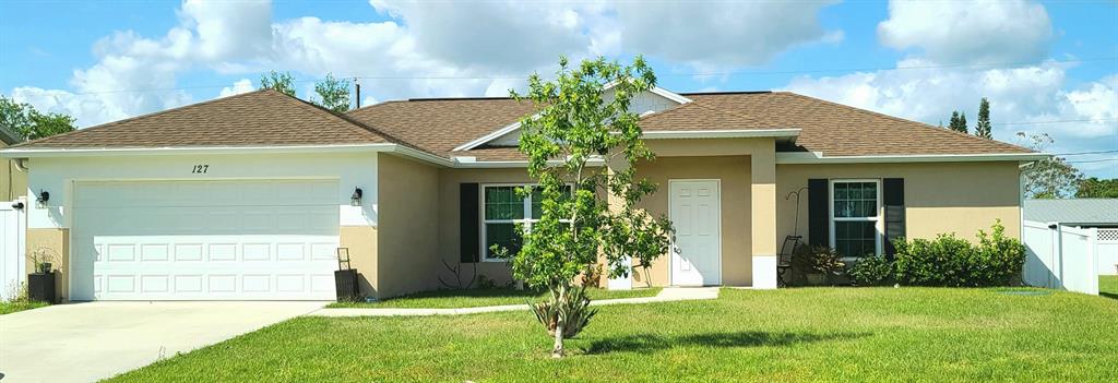 Photo of 127 SW Grove Avenue, Port Saint Lucie, FL 34983 (MLS # R10702226)