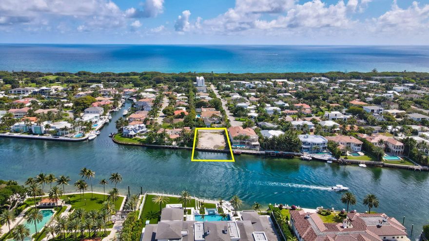 A newly constructed Intracoastal estate, elevated and sited on 93± feet of no-wake Intracoastal frontage, offering commanding water views across the prestigious Fifth Avenue Estates enclave. Designed by award-winning Constructure Inc. in collaboration with Gregory Anderson Architects, this residence represents a rare convergence of architecture, scale, and premier Boca Raton waterfront positioning.



A grand auto court and motor plaza framed by mature tropical landscaping sets a sophisticated arrival, leading to an open-air portico entry that establishes a seamless transition between indoor and outdoor living. The residence is designed for both formal entertaining and effortless everyday luxury, with spaces oriented to maximize water views and natural light. Outdoor living is defined by three expansive lanais, including a fully appointed summer kitchen and resort-style pool, creating multiple environments for hosting and private relaxation along the Intracoastal.



Interior amenities are curated to the level of a private members' club, featuring a club room with professional bar, library, private office, and a striking two-story staircase tower. An Intracoastal loft room offers elevated water vistas, while refined service areas include a butler's pantry, two utility rooms, elevator, and a four-bay garage--delivering both function and discretion.



This exceptional waterfront offering delivers timeless architecture, privacy, and global appeal, positioned among Boca Raton's most distinguished Intracoastal estates and suited for a discerning international buyer seeking enduring value and lifestyle prestige.