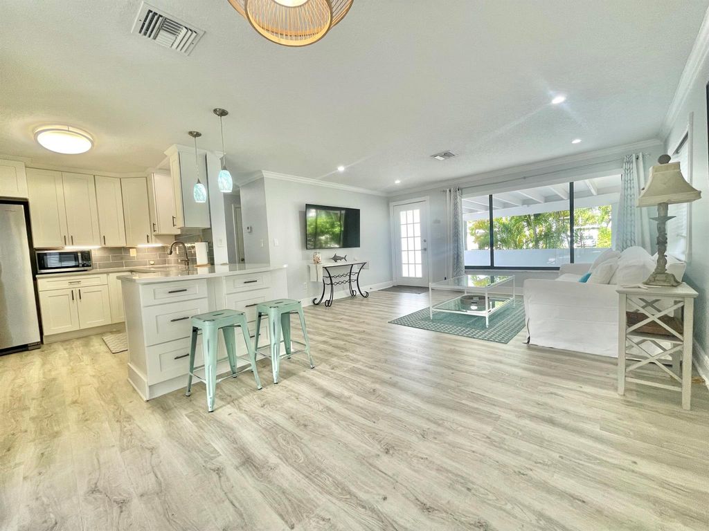Photo of 3420 Palm Court, Jupiter, FL 33469 (MLS # R11033021)