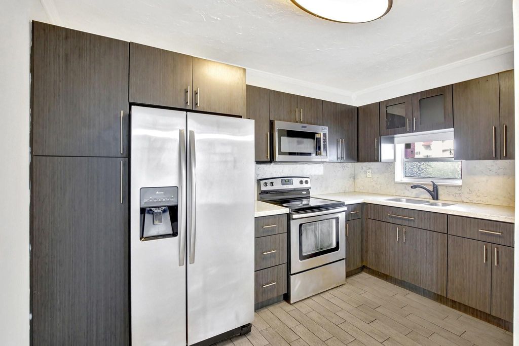 Photo of 9400 N Hollybrook Lake Drive #105, Pembroke Pines, FL 33025 (MLS # F10511150)