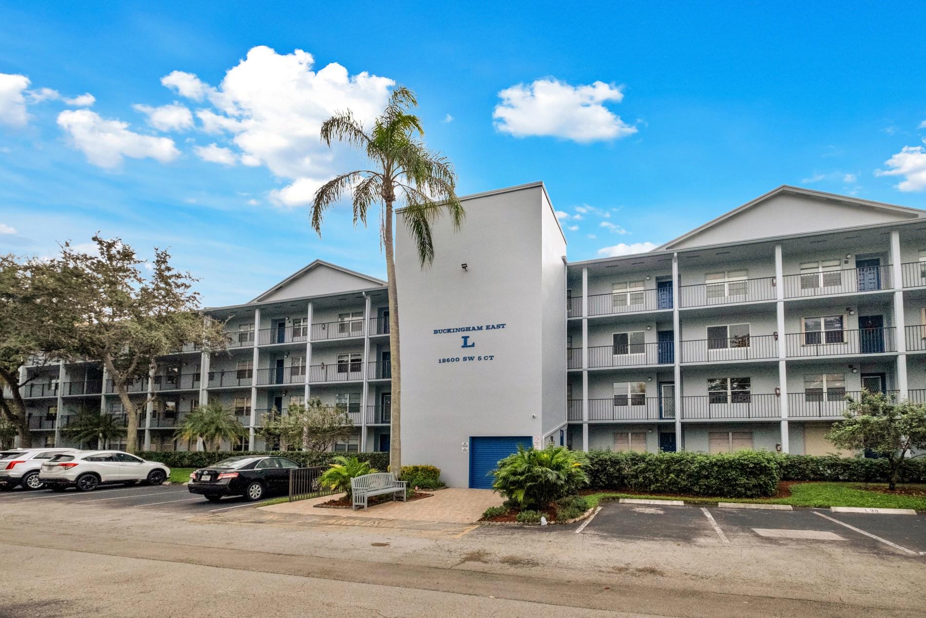 This newly updated and spacious condo on the fourth floor. Wood floor throughout and freshly painted, this bright unit is located in a very private and serene area within the village. The kitchen and both of the bathrooms showcase brand new pristine white shaker cabinets, new granite counter tops/back splash, new sinks, new faucets, and new recessed lighting. The screened in porch features peaceful garden views. All impact windows that allow plenty of natural light to enter through the property. Other upgrades include a new Refrigerator, dishwasher, microwave, and ceiling fans. Century Village is a 55+ gated community with an active adult lifestyle. All residents can indulge in endless amenities, year around events, and social activities. Video Available.