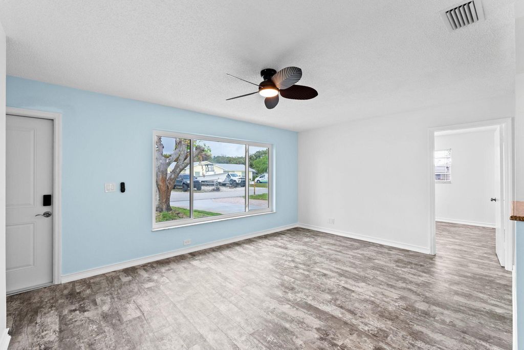Photo of 8675 SE Keathley Ct, Hobe Sound, FL 33455 (MLS # B26014251)