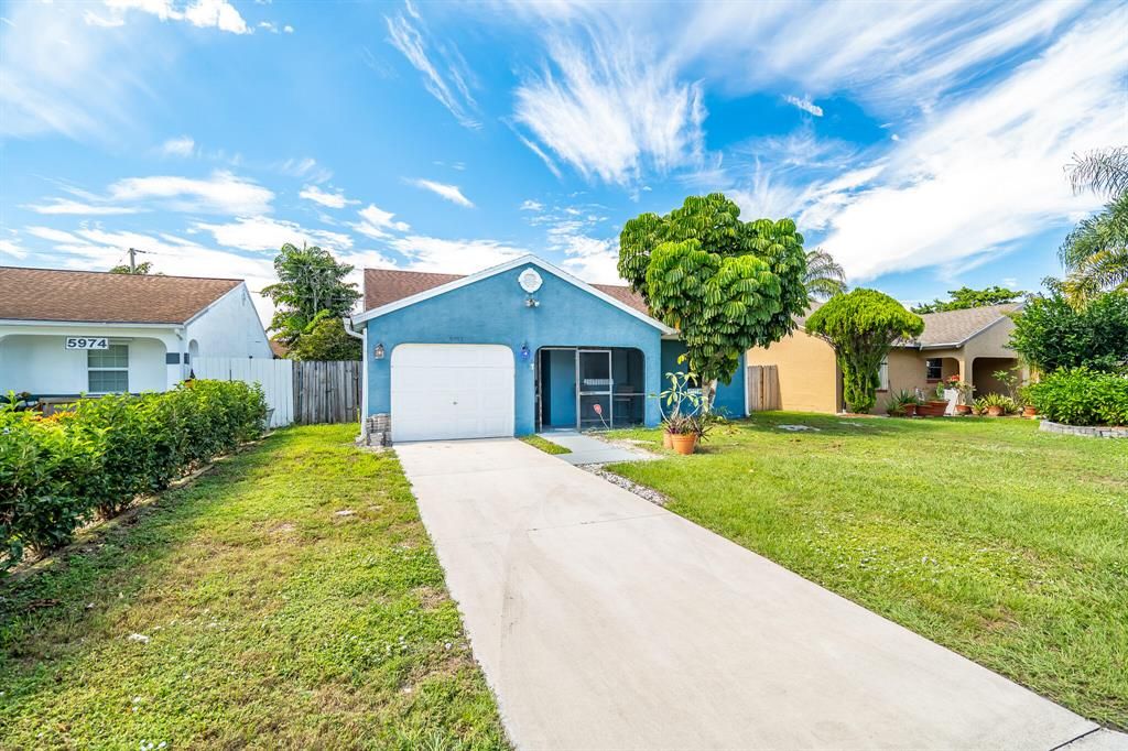 Photo of 5952 SE Mitzi Lane, Stuart, FL 34997 (MLS # R10746327)