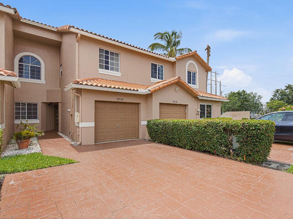 Photo of 8596 Jade Drive, Tamarac, FL 33321 (MLS # B26049008)