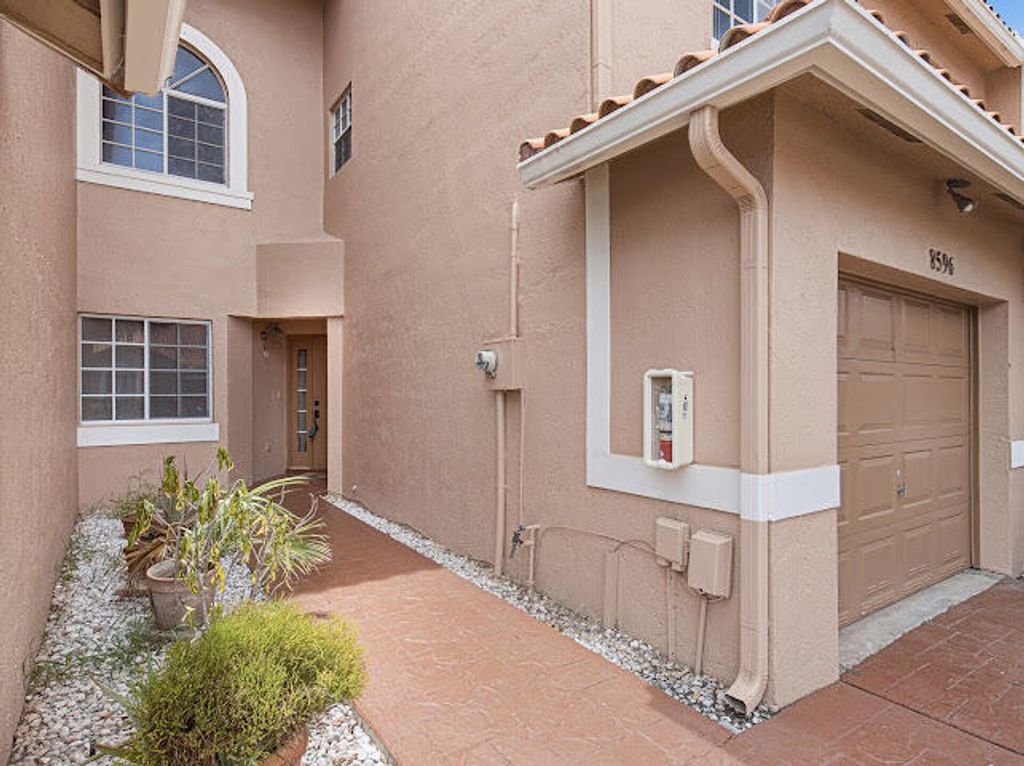 Photo of 8596 Jade Drive, Tamarac, FL 33321 (MLS # B26049008)
