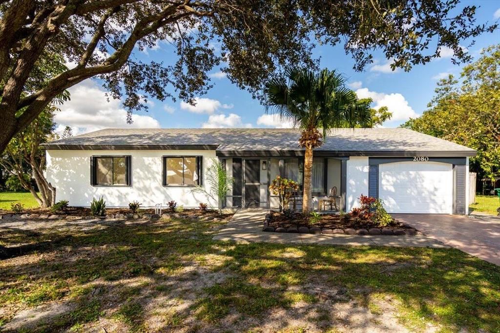Photo of 2080 SE Triumph Road, Port Saint Lucie, FL 34952 (MLS # R10860397)