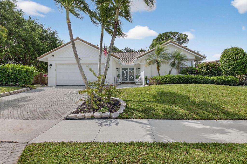 Photo of 2402 NW 30th Street, Boca Raton, FL 33431 (MLS # B26031666)