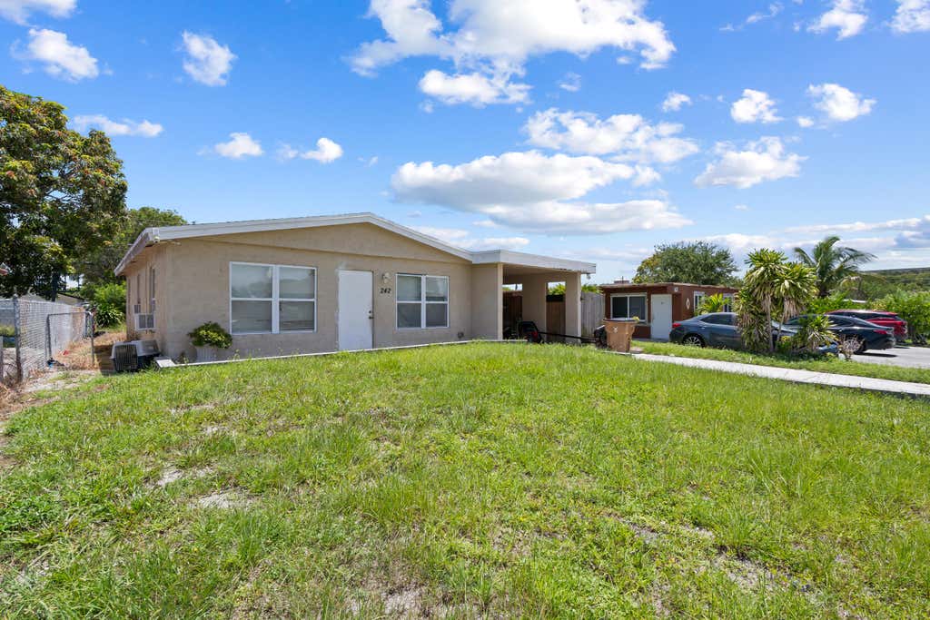 Photo of 242 SW 3RD Street, Deerfield Beach, FL 33441 (MLS # B26053879)