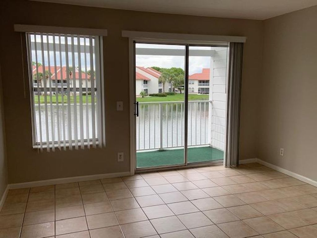 Photo of 265 Cypress Point Drive #265, Palm Beach Gardens, FL 33418 (MLS # R10960373)